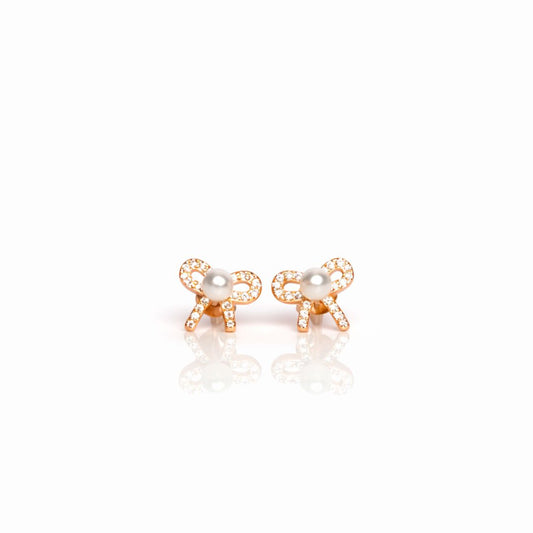 925 sterling silver pearl bow stud earrings with CZ stones in rose gold polish
