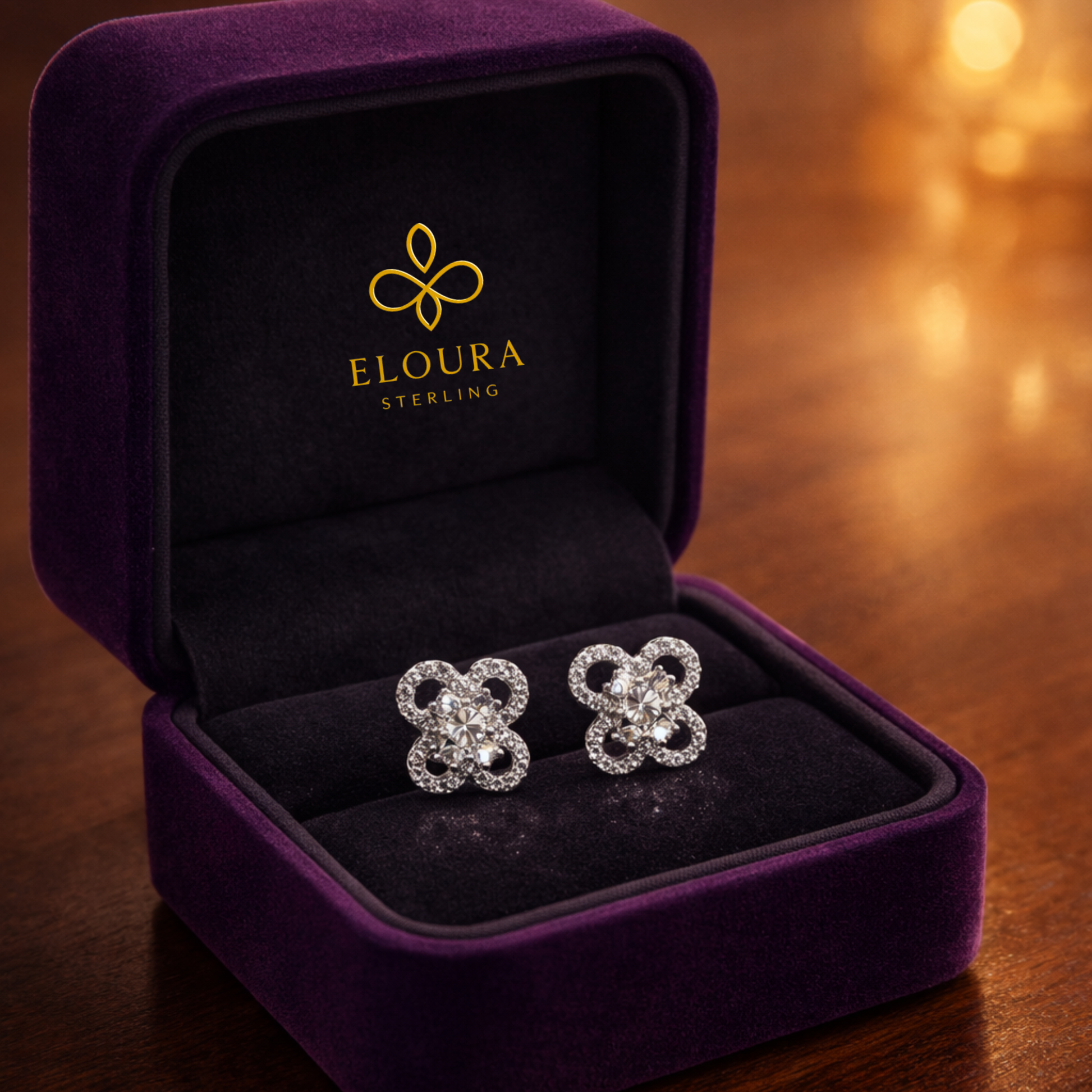 Silver floral clover CZ stud earrings in 925 sterling silver