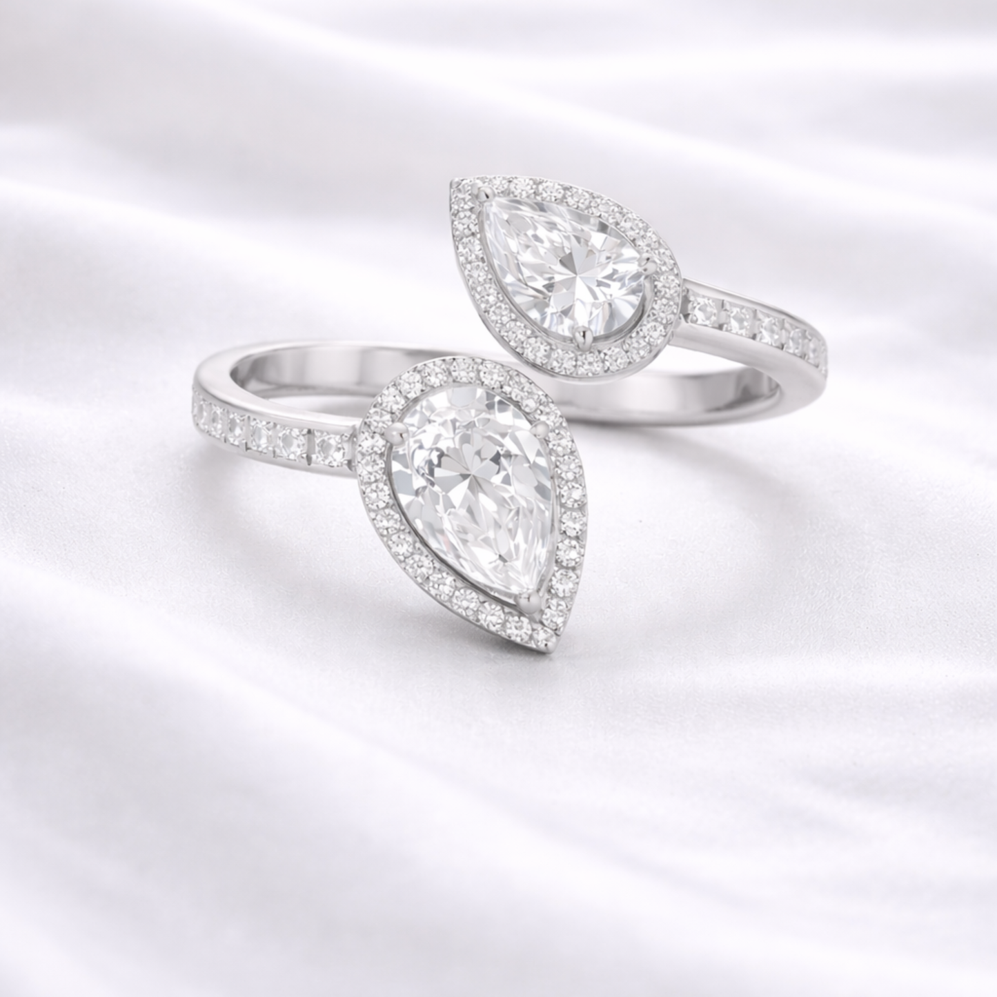 Silver double pear CZ ring in 925 sterling silver with halo design