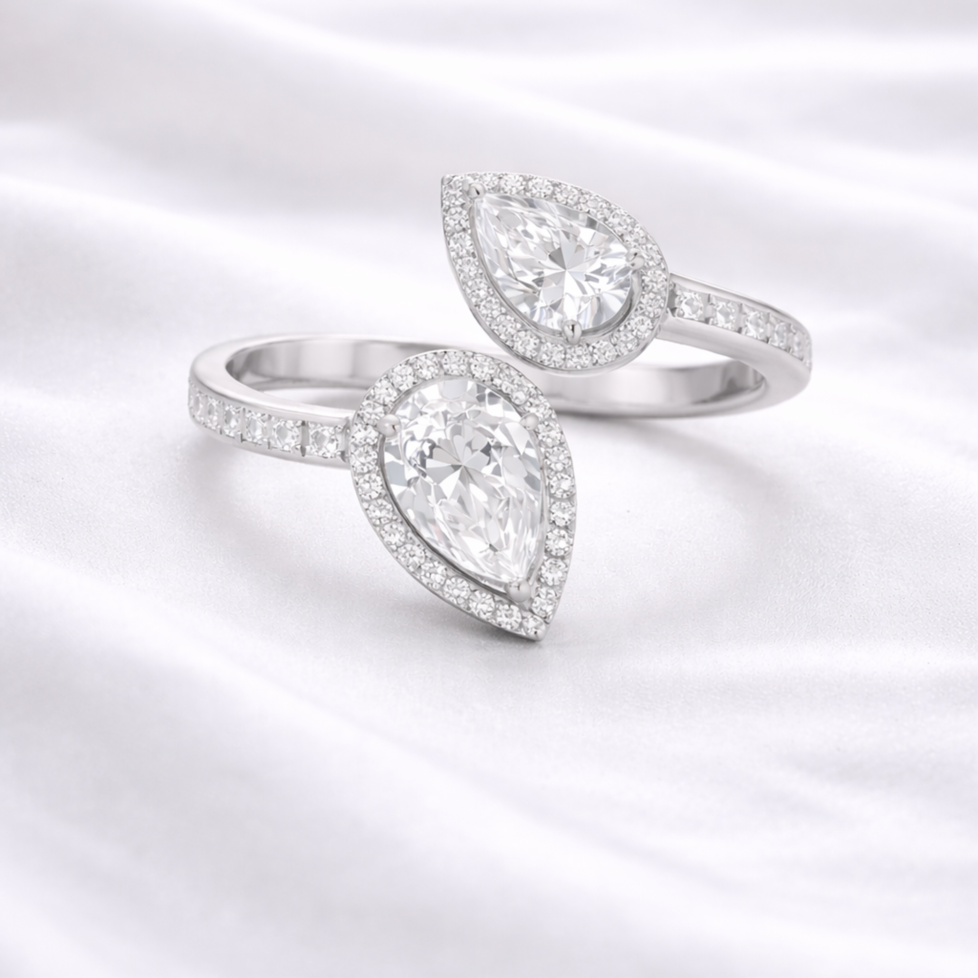 Silver double pear CZ ring in 925 sterling silver with halo design