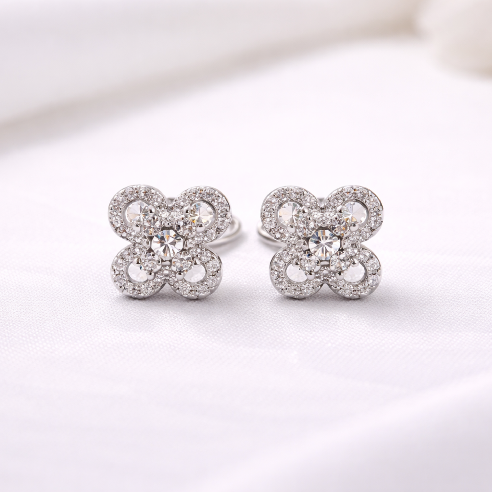 Silver floral clover CZ stud earrings in 925 sterling silver